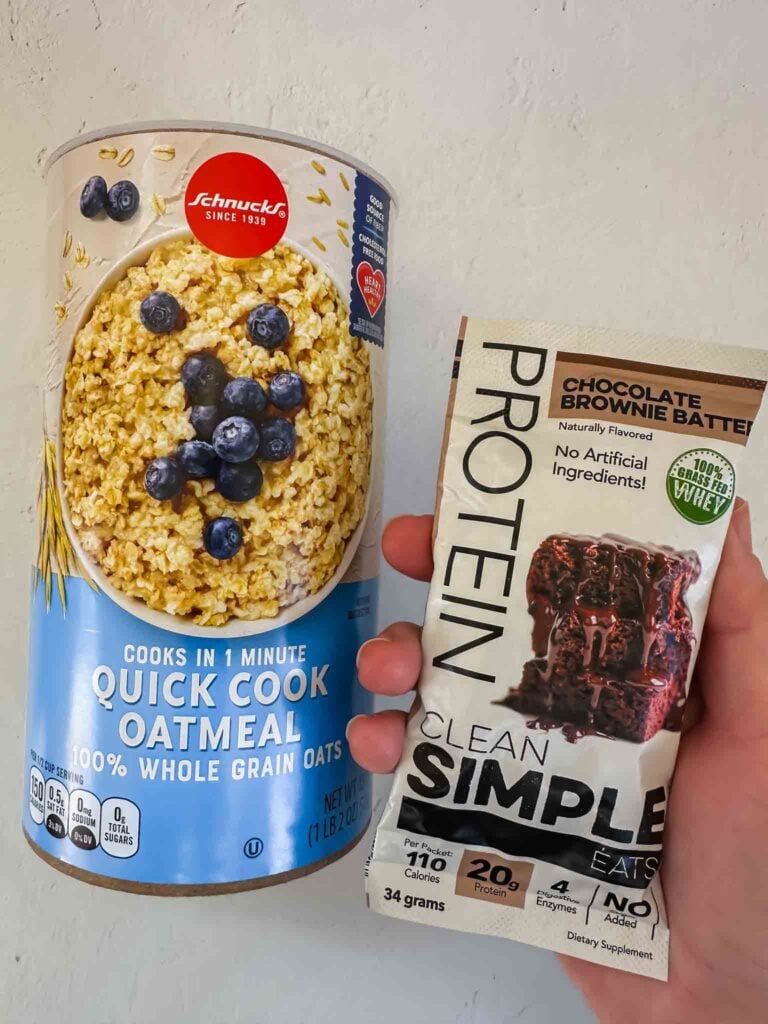 Box of quick cook oatmeal with package of protein powder