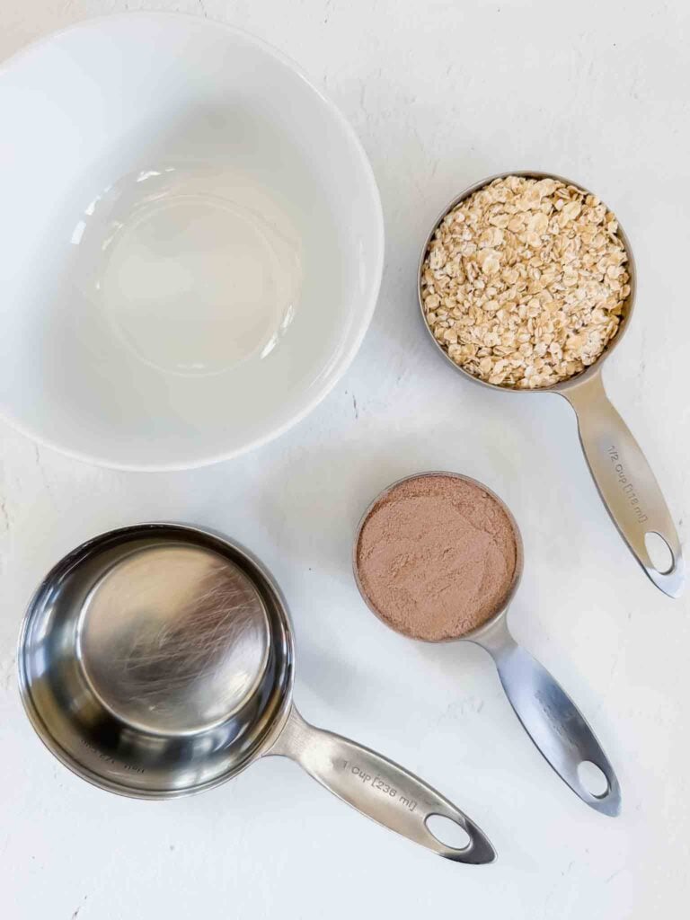 Ingredients for protein powder oatmeal in measuring cups (details in post)