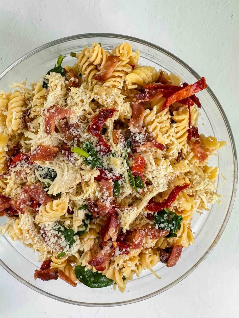 Bowl of tuscan chicken pasta salad (recipe in post)