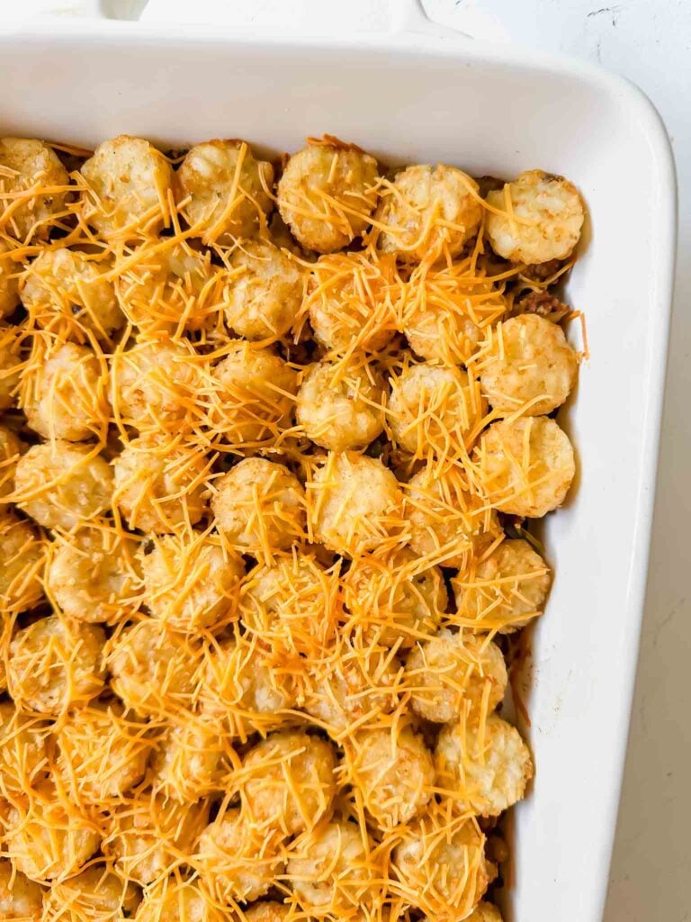 Dish with cheeseburger tater tot casserole (recipe in post)