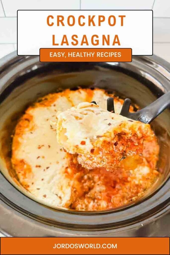 This is a pinterest pin for crockpot lasagna. This is a picture of crockpot lasagna. There's a black ceramic insert filled with cheesy lasagna noodles covered in meat sauce. A spoon is holding up a portion.
