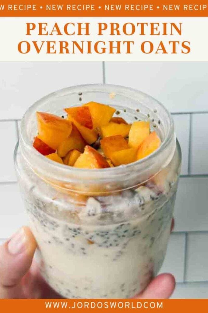 There is a pinterest pin of peach protein overnight oats. This is a picture of peach overnight oats. There is a glass jar filled with oats, chia seeds, and chopped peaches. The title of the recipe is on the picture.