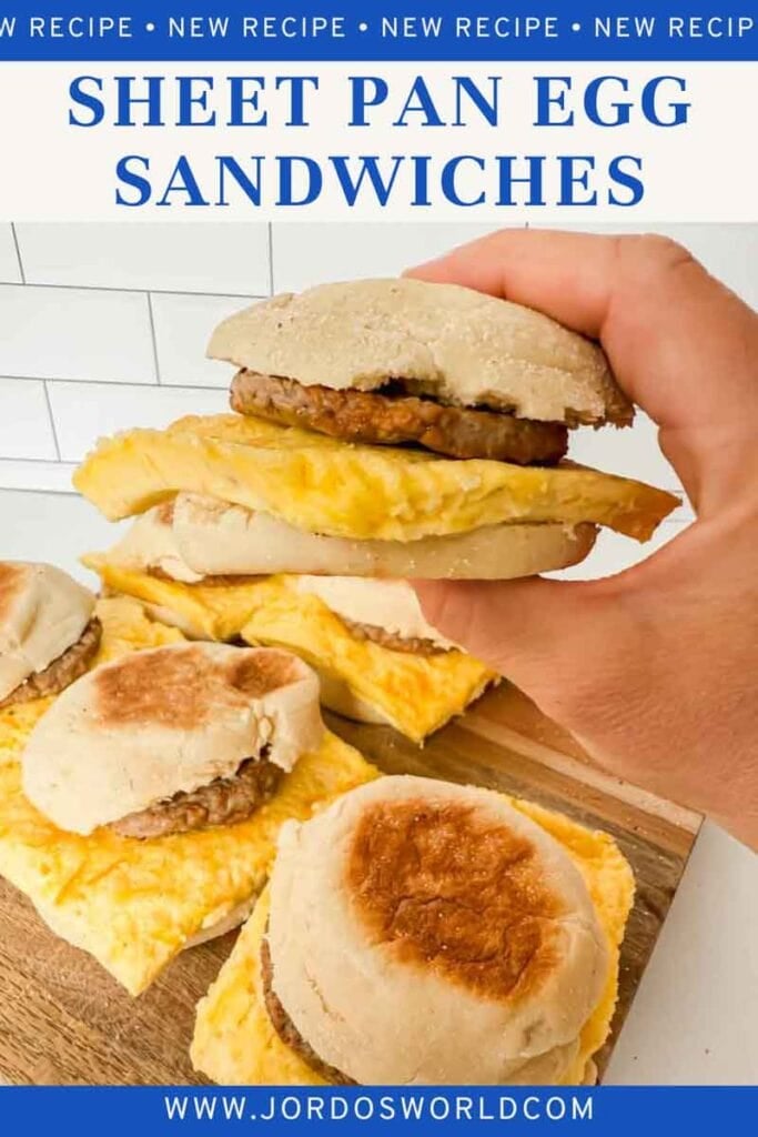 This is a pinterest pin for sheet pan egg breakfast sandwiches. There's a picture of the breakfast sandwich with the title of the recipe on it.