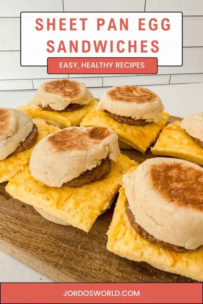 This is a pinterest pin for sheet pan egg breakfast sandwiches. There's a picture of the breakfast sandwich with the title of the recipe on it.