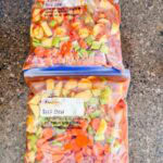 This is two gallon ziploc bags filled with beef stew. Each gallon bag has beef stew, potatoes, carrots, celery, and lentils.